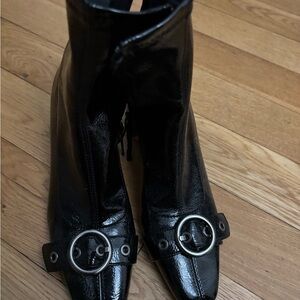 Sleek Black Ankle Boots with Silver Buckle